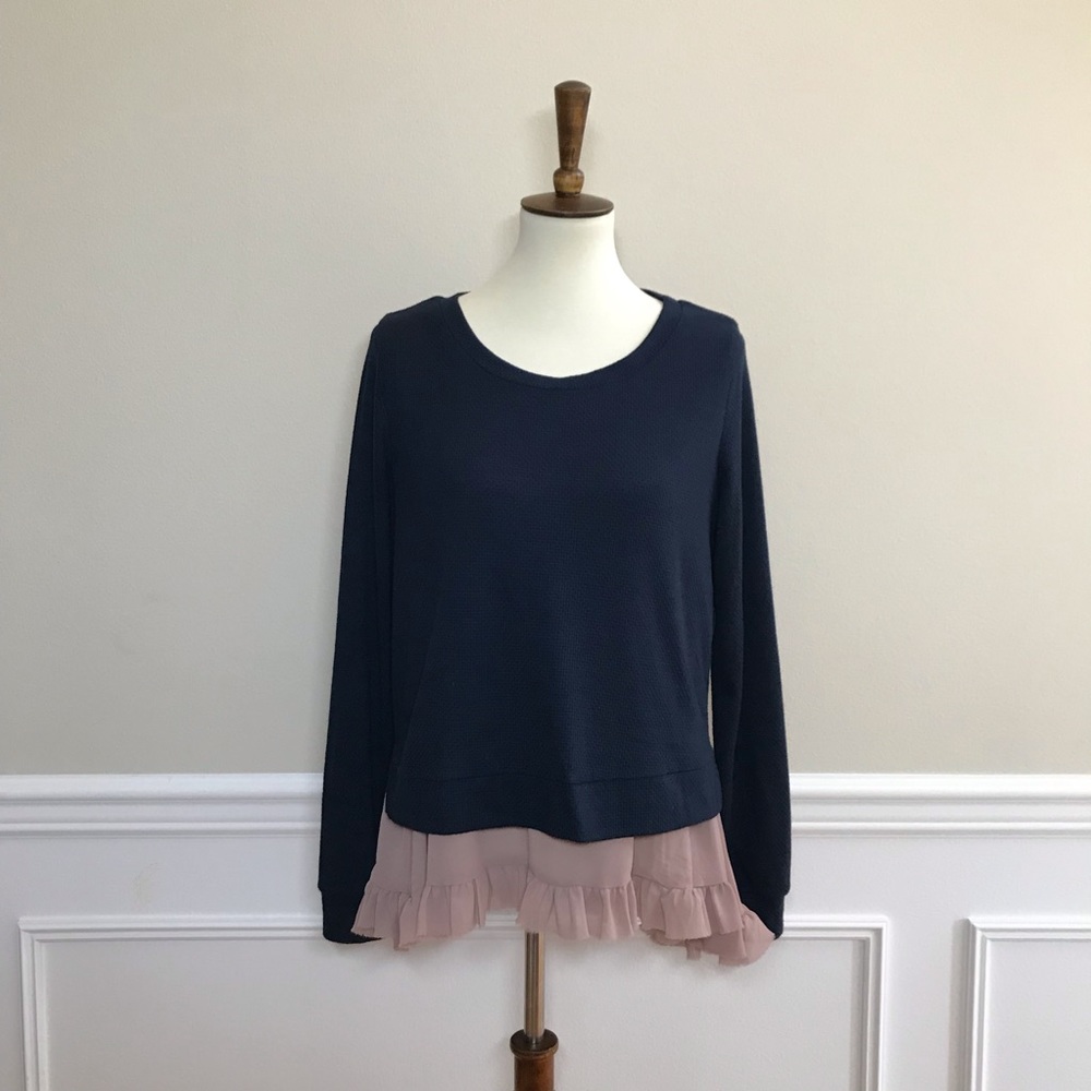 Comme Toi | Navy sweater with rose under shirt.